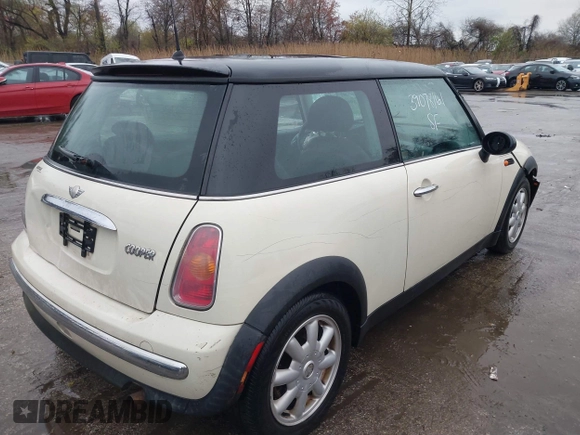2004 MINI Hardtop with VIN WMWRC33434TJ60941, listed as a IAAI auction lot 39078161 with 143,107 mi miles and . Bid and sale history available at DreamBid. Image 4.