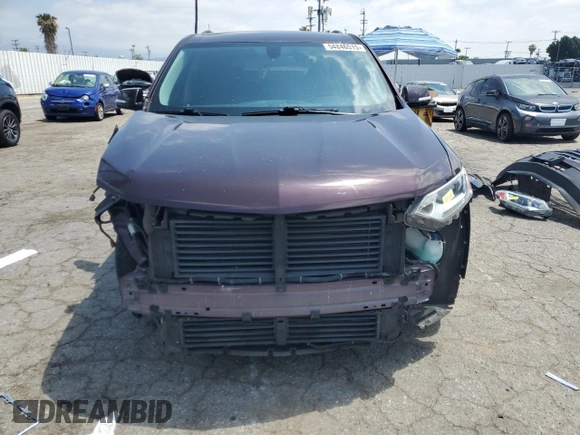 2018 Chevrolet Traverse LT Cloth z VIN 1GNERGKW6JJ200115, wystawiony jako Copart lot #54846515 z przebiegiem 79 785 mil mil oraz Szkoda całkowita • Salvage title. Historia ofert i sprzedaży dostępna na DreamBid. Obrazek 5.