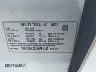 2021 Tesla Model X Long Range Plus with VIN 5YJXCDE29MF316169, listed as a IAAI auction lot 41232066 with 53,235 mi miles and . Bid and sale history available at carsss.com. Image 9.