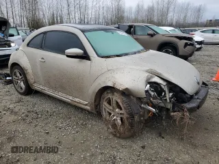 2013 Volkswagen Beetle 2.5L w/Sun with VIN 3VWJP7AT2DM673129, listed as a Copart auction lot 43284955 with 145,864 mi miles and Salvage title. Bid and sale history available at DreamBid. Image 4.