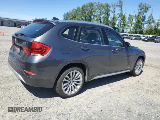 2013 BMW X1 xDrive28i z VIN WBAVL1C5XDVR89392, wystawiony jako Copart lot #55699185 z przebiegiem 127 856 mil mil oraz Czysty tytuł • Clean title. Historia ofert i sprzedaży dostępna na DreamBid. Obrazek 3.