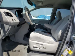 2014 Toyota Sienna LE AAS with VIN 5TDKK3DC1ES504232, listed as a Copart auction lot 54169005 with 103,724 mi miles and Salvage Title. Bid and sale history available at DreamBid. Image 7.