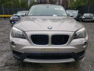 2014 BMW X1 xDrive28i with VIN WBAVL1C52EVY15236, listed as a Copart auction lot 50140885 with 141,088 mi miles and Salvage Title. Bid and sale history available at carsss.com. Image 5.