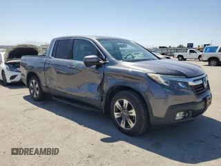 2019 Honda Ridgeline RTL-T with VIN 5FPYK2F68KB003907, listed as a Copart auction lot 61276325 with 59,612 mi miles and Salvage title. Bid and sale history available at DreamBid. Image 4.