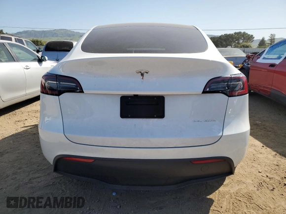2024 Tesla Model Y Long Range with VIN 7SAYGDEE0RF081948, listed as a Copart auction lot 52612805 with 12,099 mi miles and Salvage Title. Bid and sale history available at DreamBid. Image 6.