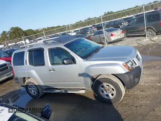 2012 Nissan Xterra X with VIN 5N1AN0NU1CC517484, listed as a IAAI auction lot 41569404 with 225,591 mi miles and . Bid and sale history available at DreamBid. Image 12.