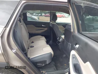 2020 Hyundai Santa Fe SE with VIN 5NMS23AD4LH142202, listed as a IAAI auction lot 42526020 with 59,964 mi miles and . Bid and sale history available at DreamBid. Image 8.