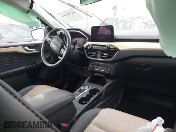2021 Ford Escape Titanium Hybrid with VIN 1FMCU9DZ1MUA01599, listed as a IAAI auction lot 41912441 with 20,660 mi miles and . Bid and sale history available at DreamBid. Image 5.