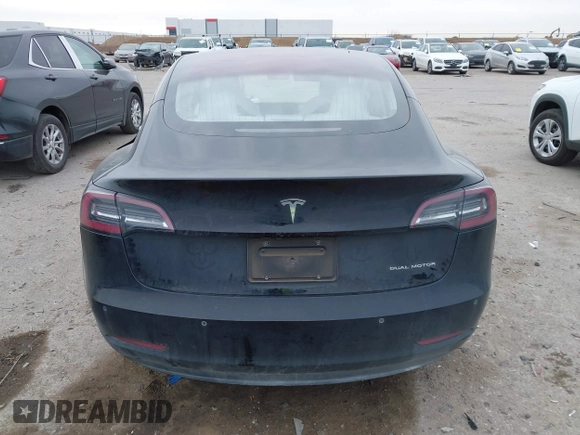 2018 Tesla Model 3 Long Range Battery with VIN 5YJ3E1EB9JF188437, listed as a IAAI auction lot 41371254 with 55,934 mi miles and . Bid and sale history available at DreamBid. Image 16.