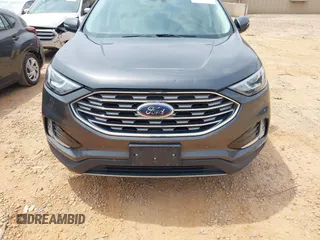2020 Ford Edge Titanium z VIN 2FMPK4K98LBA76737, wystawiony jako IAAI lot #41981689 z przebiegiem 93 501 mil mil oraz . Historia ofert i sprzedaży dostępna na DreamBid. Obrazek 12.
