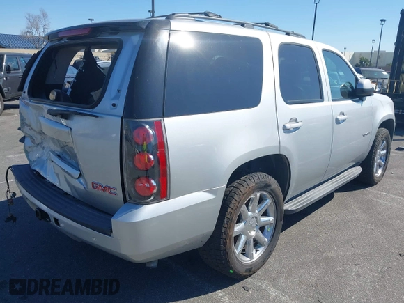 2013 GMC Yukon SLT with VIN 1GKS1CE07DR157076, listed as a IAAI auction lot 41557228 with 148,242 mi miles. Bid and sale history available at carsss.com. Image 4.