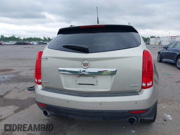 2014 Cadillac SRX Performance Collection z VIN 3GYFNCE35ES610504, wystawiony jako IAAI lot #42133548 z przebiegiem 140 306 mil mil oraz . Historia ofert i sprzedaży dostępna na DreamBid. Obrazek 16.