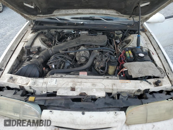 1994 Ford Thunderbird LX with VIN 1FALP62W6RH206764, listed as a Copart auction lot 44213965 with 105,353 mi miles and Salvage Title. Bid and sale history available at DreamBid. Image 11.
