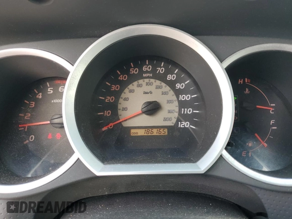 2005 Toyota Tacoma PreRunner with VIN 5TEKU72N65Z049435, listed as a Copart auction lot 87174504 with 186,165 mi miles and Salvage Title. Bid and sale history available at carsss.com. Image 9.