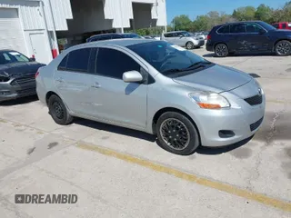 2009 Toyota Yaris with VIN JTDBT903891331057, listed as a IAAI auction lot 41849148 with 182,142 mi miles. Bid and sale history available at carsss.com. Image 1.