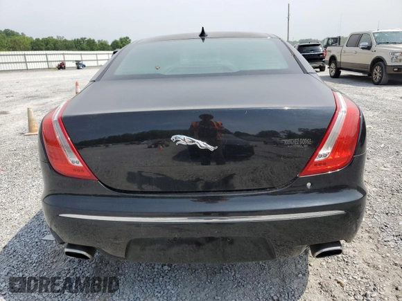 2014 Jaguar XJ with VIN SAJWA2GZ7E8V60213, listed as a Copart auction lot 53382454 with 88,870 mi miles and Salvage Title. Bid and sale history available at carsss.com. Image 6.
