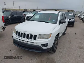 2013 Jeep Compass Sport with VIN 1C4NJCBA4DD275668, listed as a IAAI auction lot 41613278 with 154,489 mi miles. Bid and sale history available at carsss.com. Image 2.
