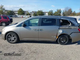 2012 Honda Odyssey EX-L with VIN 5FNRL5H63CB016526, listed as a IAAI auction lot 41701396 with 132,016 mi miles and . Bid and sale history available at carsss.com. Image 15.