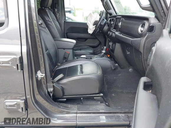 2022 Jeep Wrangler Unlimited Sahara Altitude z VIN 1C4HJXEG6NW103779, wystawiony jako IAAI lot #42563826 z przebiegiem 79 315 mil mil oraz . Historia ofert i sprzedaży dostępna na DreamBid. Obrazek 5.