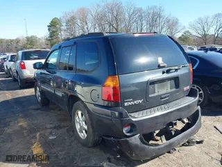 2005 GMC Envoy SLE with VIN 1GKDS13S252305661, listed as a IAAI auction lot 41751800 with 235,090 mi miles. Bid and sale history available at carsss.com. Image 3.