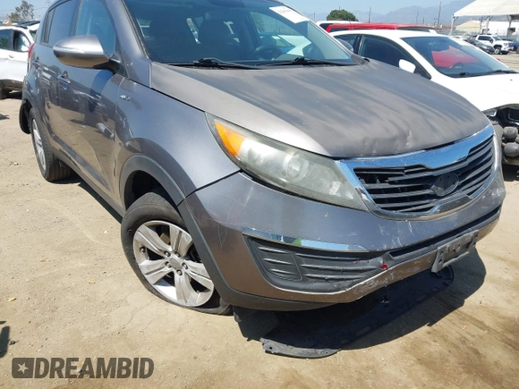 2011 Kia Sportage LX with VIN KNDPBCA20B7170217, listed as a IAAI auction lot 42303069 with 186,994 mi miles and . Bid and sale history available at DreamBid. Image 12.