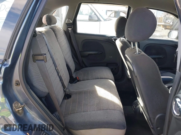 2003 Chrysler PT Cruiser with VIN 3C4FY48B13T570032, listed as a IAAI auction lot 41603951 with 97,590 mi miles. Bid and sale history available at carsss.com. Image 8.