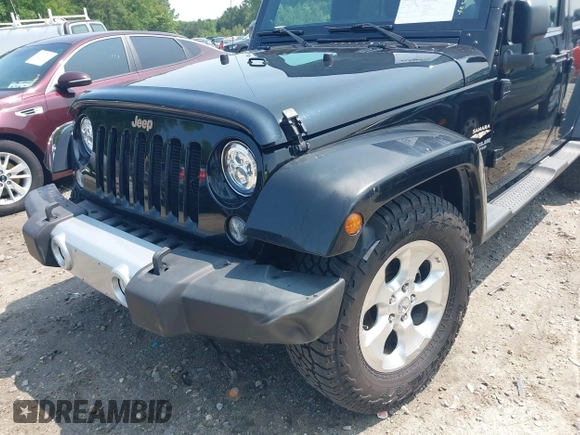 2014 Jeep Wrangler Unlimited Sahara with VIN 1C4BJWEG0EL273086, listed as a IAAI auction lot 42340938 with 121,448 mi miles and . Bid and sale history available at DreamBid. Image 6.