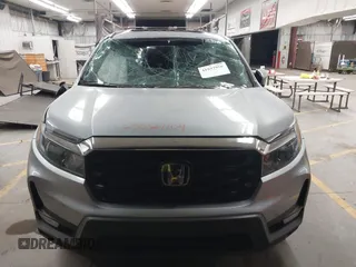 2023 Honda Passport EX-L with VIN 5FNYF8H56PB025612, listed as a IAAI auction lot 41937956 with 31,065 mi miles and . Bid and sale history available at DreamBid. Image 12.