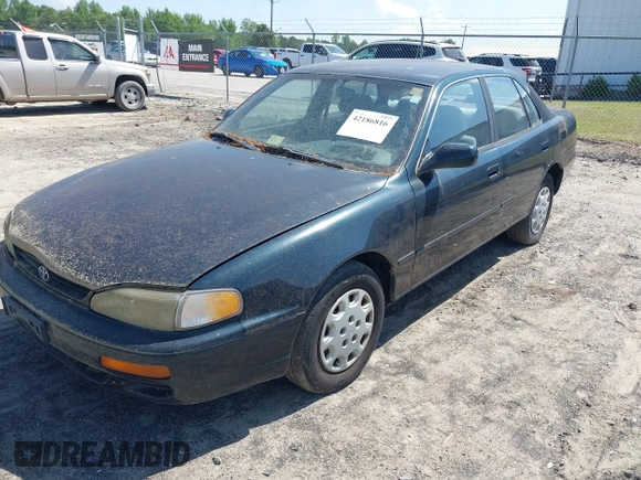 1995 Toyota Camry LE z VIN 4T1SK12E3SU576500, wystawiony jako IAAI lot #42186816 z przebiegiem 216 809 mil mil oraz . Historia ofert i sprzedaży dostępna na DreamBid. Obrazek 2.