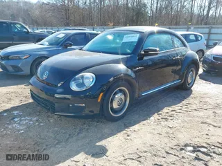 2012 Volkswagen Beetle 2.5L w/Sun/Sound/Nav PZEV with VIN 3VWHP7AT1CM652074, listed as a IAAI auction lot 41374829 with 1 mi miles. Bid and sale history available at carsss.com. Image 2.