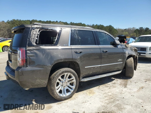 2019 GMC Yukon SLT with VIN 1GKS1BKC1KR117730, listed as a Copart auction lot 49438235 with 147,347 mi miles and Salvage Title. Bid and sale history available at carsss.com. Image 3.