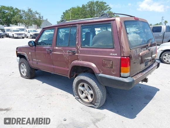 2000 Jeep Cherokee z VIN 1J4FF48S7YL129654, wystawiony jako IAAI lot #42201026 z przebiegiem 272 922 mil mil oraz . Historia ofert i sprzedaży dostępna na DreamBid. Obrazek 3.