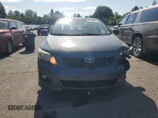 2010 Toyota Corolla with VIN 2T1BU4EE8AC479493, listed as a Copart auction lot 61130945 with 167,413 mi miles and Salvage title. Bid and sale history available at DreamBid. Image 5.
