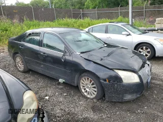 2006 Mercury Milan Premier z VIN 3MEFM08106R640762, wystawiony jako Copart lot #58933065 z przebiegiem Nie podano mil oraz Szkoda całkowita • Salvage title. Historia ofert i sprzedaży dostępna na DreamBid. Obrazek 4.