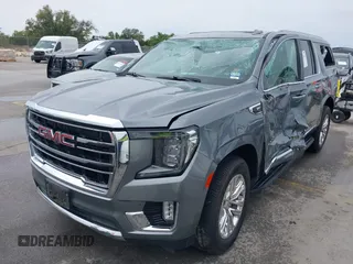 2022 GMC Yukon XL SLT with VIN 1GKS2GKD2NR153790, listed as a IAAI auction lot 41911362 with 84,739 mi miles. Bid and sale history available at carsss.com. Image 2.