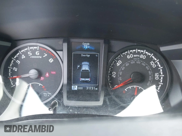2023 Toyota Tacoma SR with VIN 3TYCZ5AN4PT149730, listed as a IAAI auction lot 42083146 with 31,731 mi miles and . Bid and sale history available at DreamBid. Image 7.