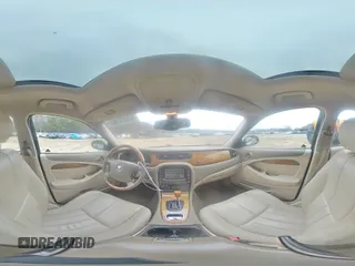 2003 Jaguar S-Type z VIN SAJEA01U33HM71782, wystawiony jako Copart lot #82969304 z przebiegiem 127 176 mil mil oraz Szkody całkowita. Historia ofert i sprzedaży dostępna na DreamBid. Obrazek 12.