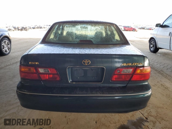 1998 Toyota Avalon XL with VIN 4T1BF18B1WU265039, listed as a Copart auction lot 52356785 with 375,814 mi miles and Salvage Title. Bid and sale history available at DreamBid. Image 6.