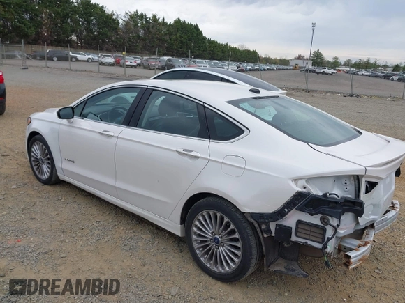 2013 Ford Fusion Titanium Hybrid with VIN 3FA6P0RU5DR357469, listed as a IAAI auction lot 41969315 with 215,732 mi miles. Bid and sale history available at carsss.com. Image 3.