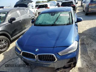 2021 BMW X2 sDrive28i with VIN WBXYH9C02M5S54591, listed as a Copart auction lot 77223834 with 0 mi miles and Salvage Title. Bid and sale history available at carsss.com. Image 5.