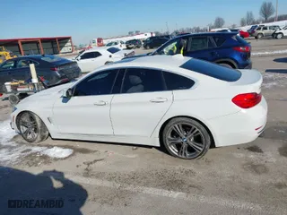 2016 BMW 4 Series 428i with VIN WBA4A9C50GG696366, listed as a IAAI auction lot 41615789 with 103,763 mi miles. Bid and sale history available at carsss.com. Image 14.