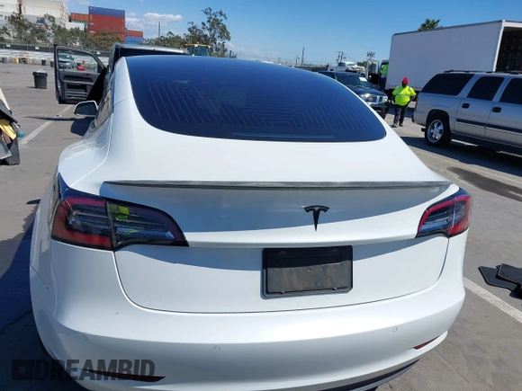 2019 Tesla Model 3 Mid Range with VIN 5YJ3E1EA5KF327181, listed as a IAAI auction lot 41860943 with 157,335 mi miles and . Bid and sale history available at DreamBid. Image 16.