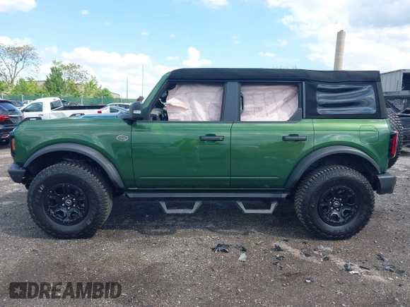 2023 Ford Bronco with VIN 1FMEE5DP0PLB80676, listed as a IAAI auction lot 42210054 with 6,796 mi miles and . Bid and sale history available at DreamBid. Image 13.