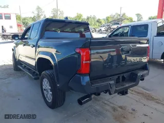 2024 Toyota Tacoma 2WD SR5 with VIN 3TMKB5FN9RM020325, listed as a IAAI auction lot 41891857 with 1,209 mi miles. Bid and sale history available at carsss.com. Image 3.