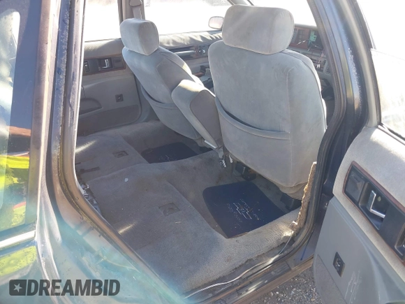 1991 Chevrolet Caprice z VIN 1G1BN53E2MW135068, wystawiony jako IAAI lot #40923869 z przebiegiem 185 732 mil mil oraz . Historia ofert i sprzedaży dostępna na DreamBid. Obrazek 8.