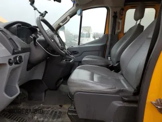 2016 Ford Transit Cargo with VIN 1FTYR2ZM2GKA64811, listed as a Copart auction lot 82696424 with 223,716 mi miles and Clean Title. Bid and sale history available at carsss.com. Image 7.