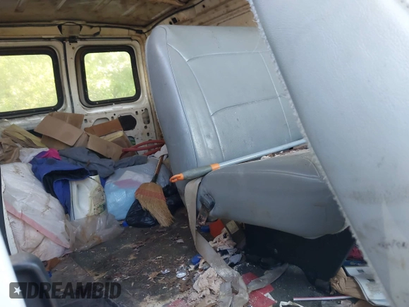 2004 Ford Econoline Cargo Commercial with VIN 1FTNE24W04HA50342, listed as a IAAI auction lot 42145274 with 158,408 mi miles and . Bid and sale history available at carsss.com. Image 8.