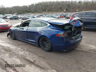 2017 Tesla Model S 100D with VIN 5YJSA1E27HF220982, listed as a IAAI auction lot 41731047 with Not Provided miles and . Bid and sale history available at DreamBid. Image 3.
