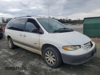 1999 Plymouth Voyager Grand SE z VIN 1P4GP44G7XB831207, wystawiony jako Copart lot #79558714 z przebiegiem 163 620 mil mil oraz Szkody całkowita. Historia ofert i sprzedaży dostępna na DreamBid. Obrazek 4.