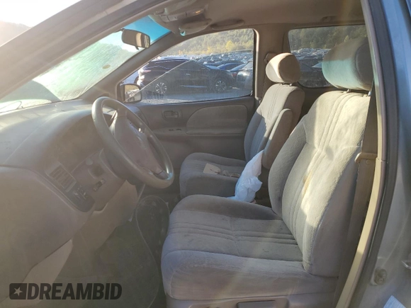 1999 Toyota Sienna LE with VIN 4T3ZF13C4XU137126, listed as a Copart auction lot 75205074 with 0 mi miles and Salvage Title. Bid and sale history available at carsss.com. Image 7.